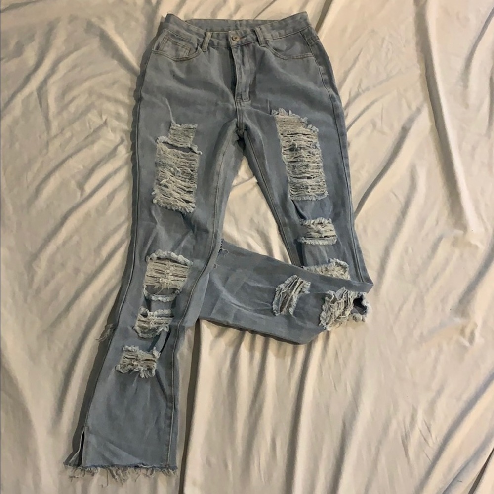 Light blue distressed jeans